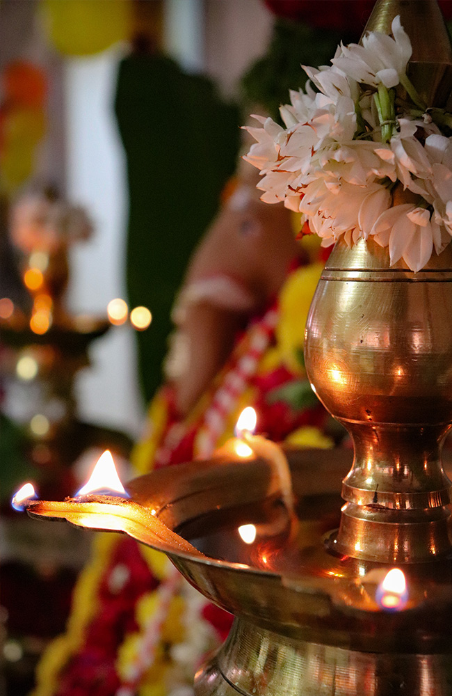 close-up-illuminated-diya-temple