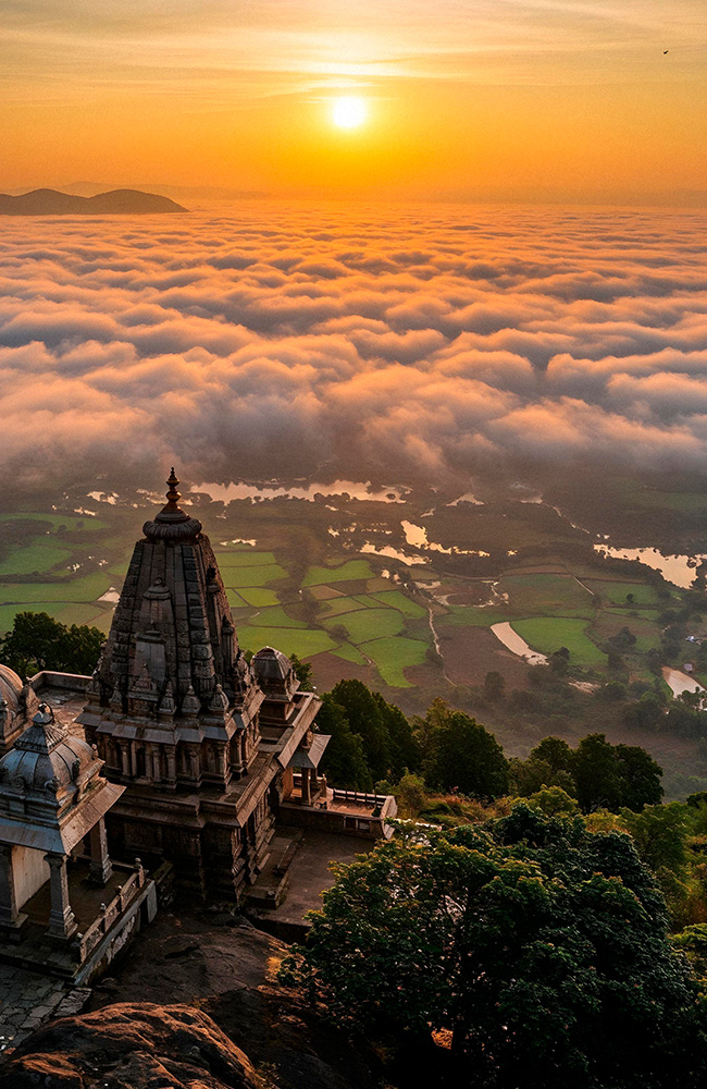 temple-atop-clouds-sunrise